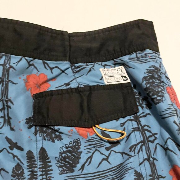 Blue and Black Swim Trunks with Red Floral Pattern - Picture 11 of 16